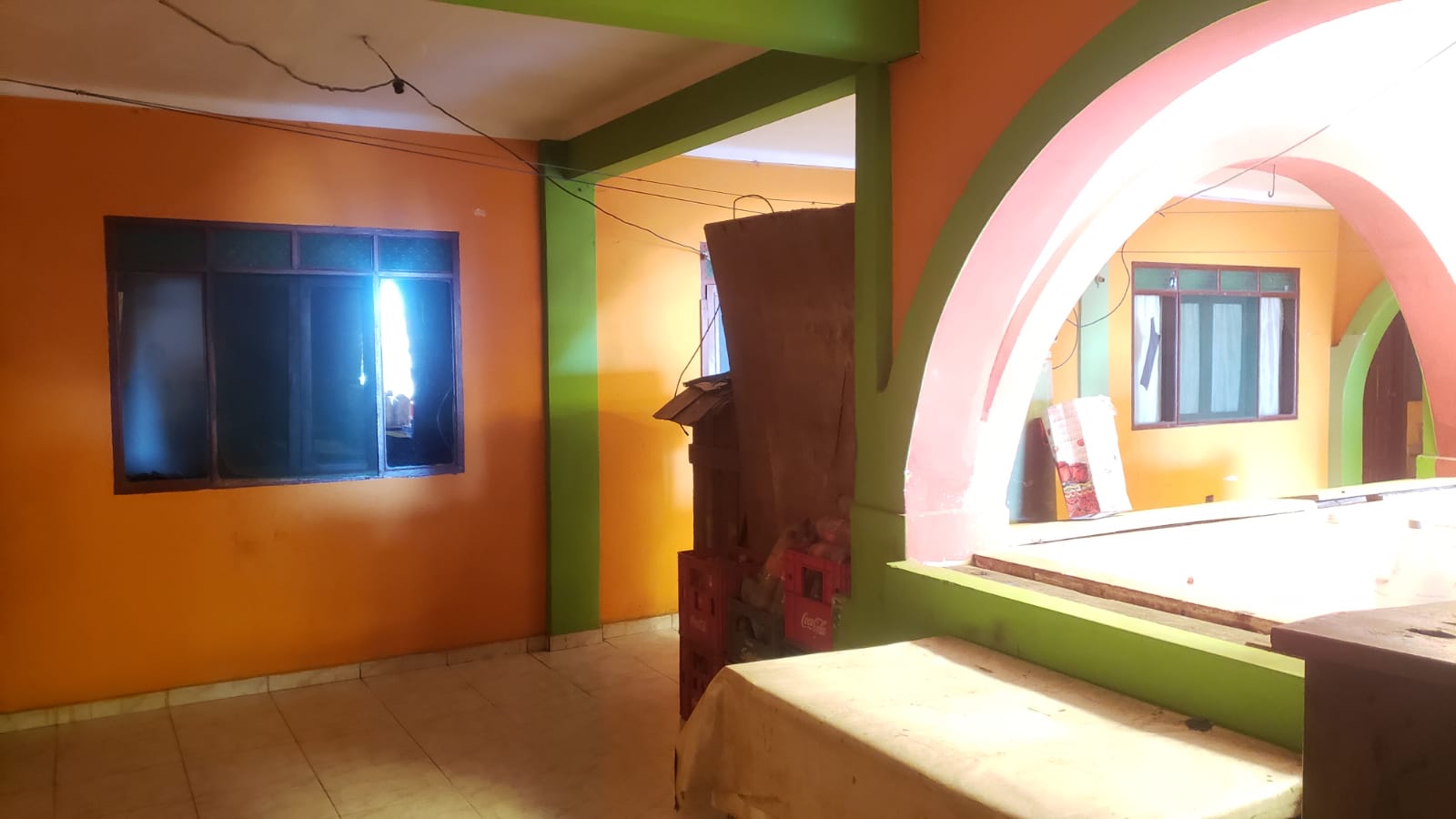 CASA SOBRE AVENIDA RADIAL 16 ½ CON TIENDAS Y CUARTOS PARA ALQUILER EN VENTA - INMUEBLE NUMERO 215