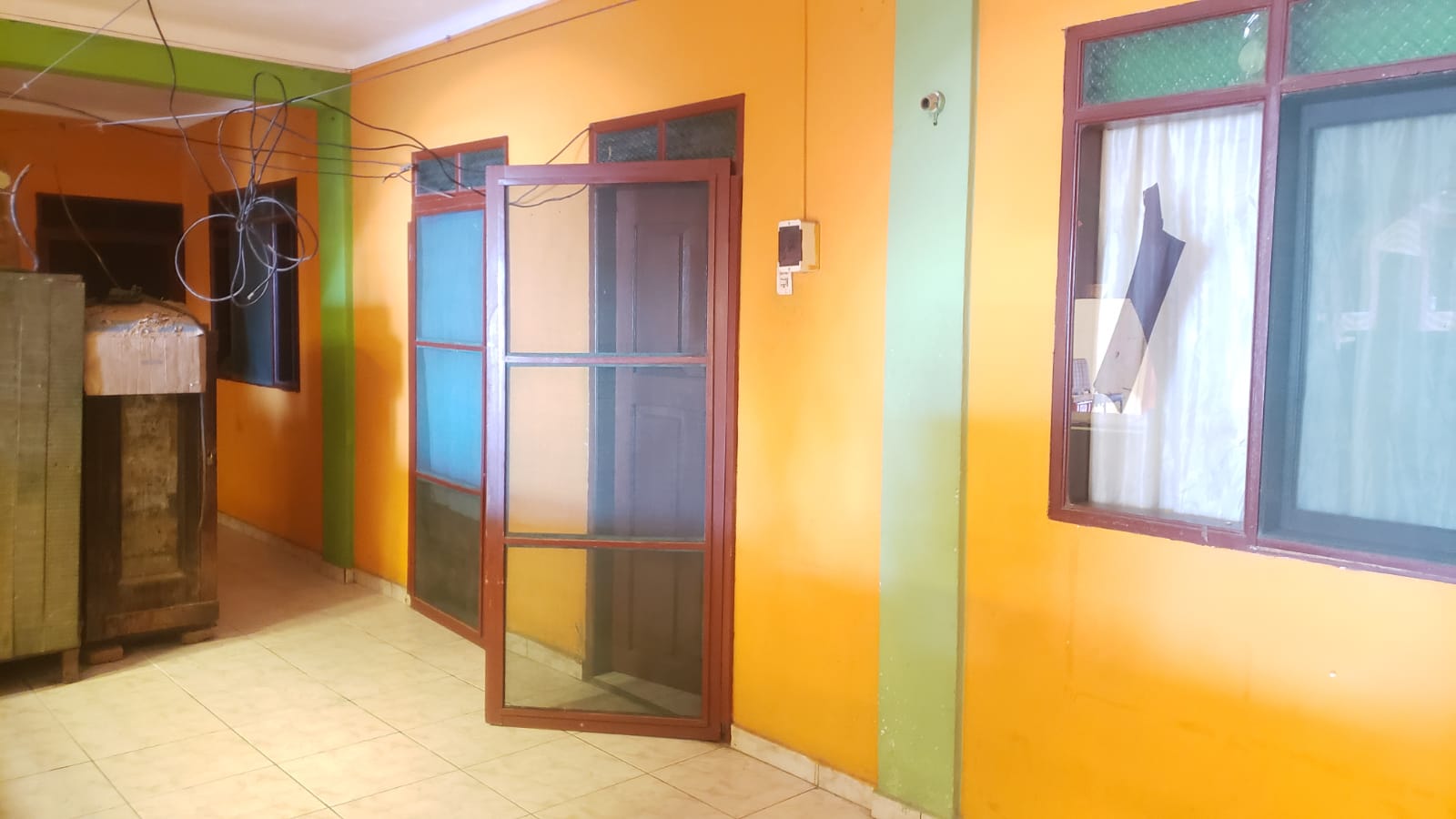 CASA SOBRE AVENIDA RADIAL 16 ½ CON TIENDAS Y CUARTOS PARA ALQUILER EN VENTA - INMUEBLE NUMERO 215